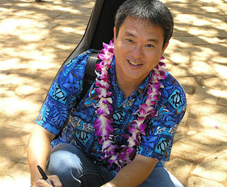 Paul signing autographs